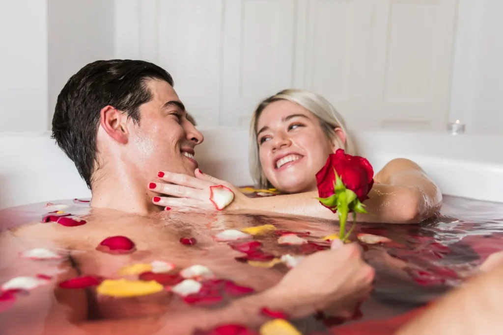 Couple enjoying a relaxing spa bath at The Royal Spa Thane
